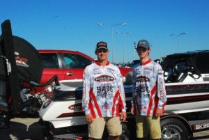 Dawn Burleigh/The Orange Leader Anthony Guidry, left, and his son, Zach, both of Kaplan, Louisiana, enjoying their third year fishing as a team in competition. The team’s catch weighed in at 9.74 on the first day of Bass Champs in Orange.  