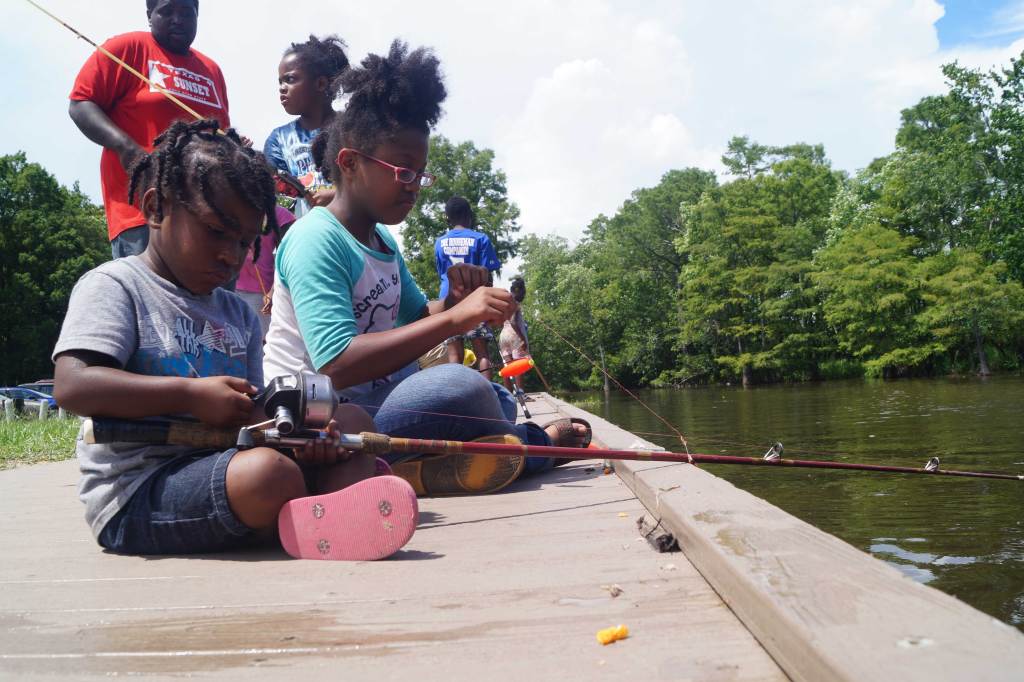 Teach a kid to fish orange leader orange leader