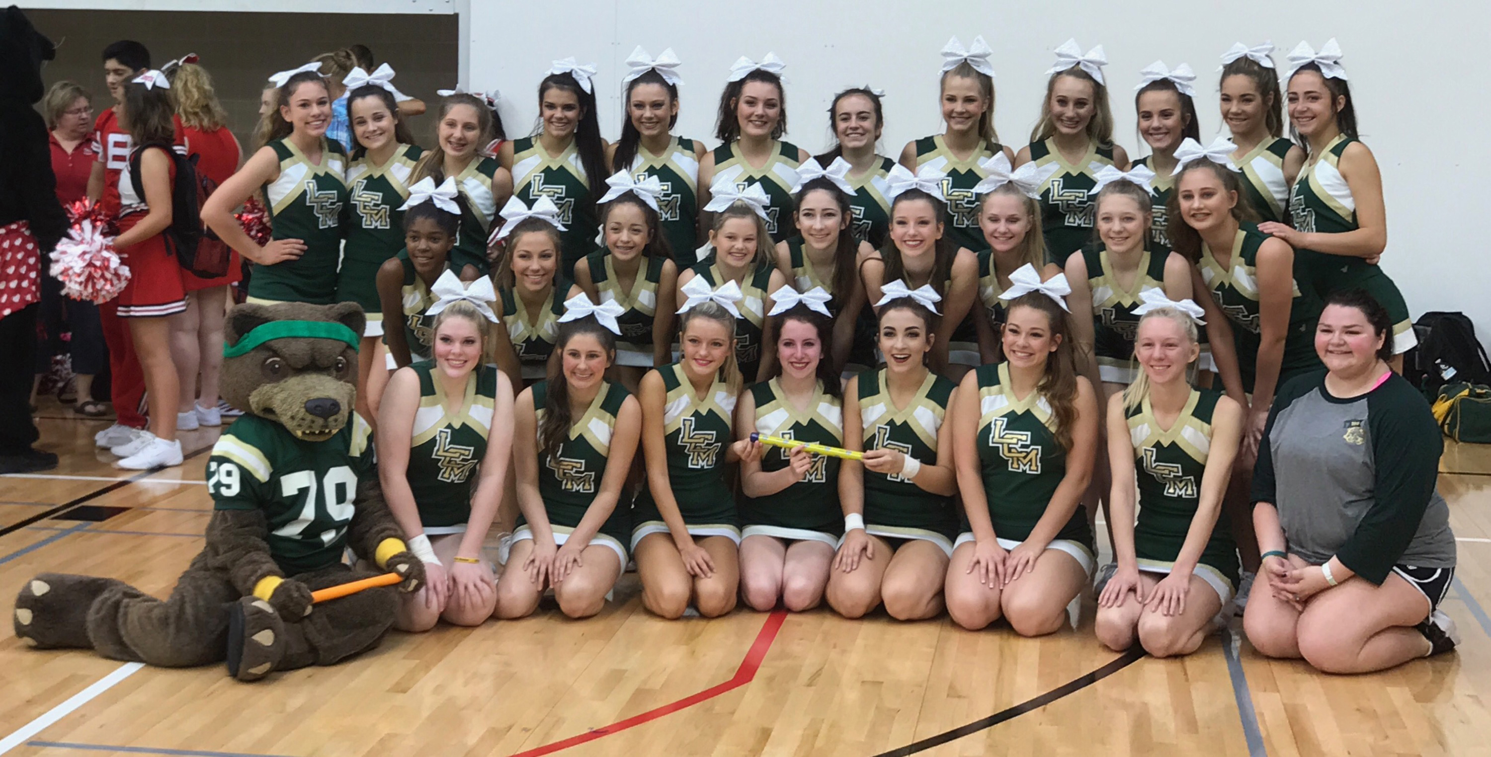 LCM Cheerleaders bring home bling Orange Leader Orange Leader